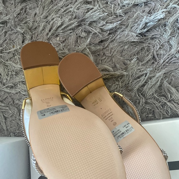 The Ully Lo mules Schutz metallic faux leather with crystal-embellished straps. - Picture 2 of 3